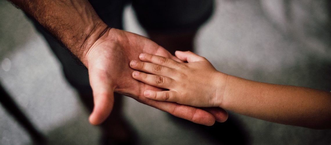 selective-focus-photography-of-child-hand-1250452